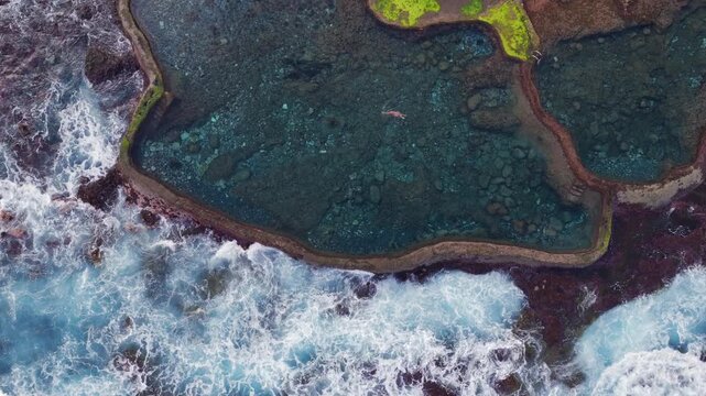 Aerial Panoramic View Woman Swimming Volcanic Rock Pool Sunrise El Hierro Canary Islands Spain Natural Pool Solitude