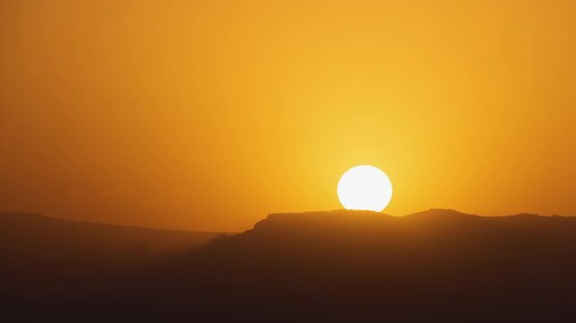 Sunset over Mysterious Desert Landscape Zoom Out Timelapse
