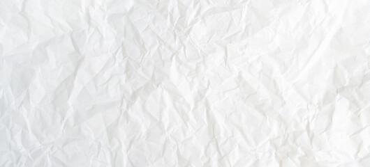 Fototapeta premium Top view and full frame of wrinkled or crumpled white paper texture used as crumpled white paper background texture in decorative art work
