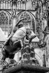 Statue of St George, while killing the dragon, in the center square of the castle complex of Prague (old town district). © stefanopez