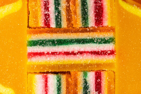Multicolored marmalade fruit candies sprinkled with sugar