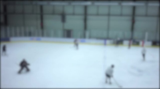 Blurred Ice Hockey Arena Background with Players on Ice