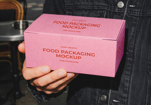 Hand Holding Food Packaging Box Mockup
