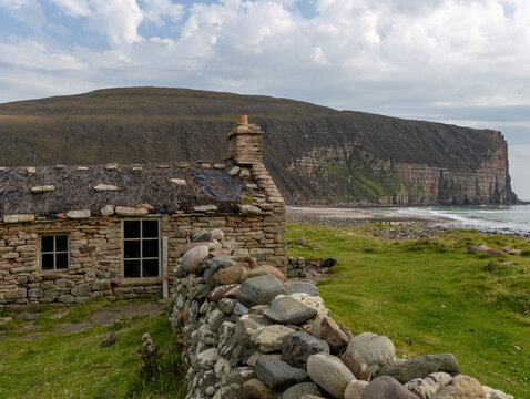 Burnmouth Bothy with a heather thatched roof  Rackwick Bay Hoy Orkney isles