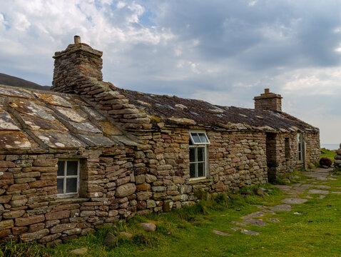 Burnmouth Bothy with a heather thatched roof  Rackwick Bay Hoy Orkney isles