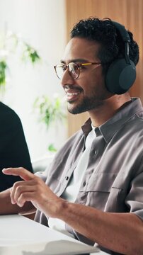 Headphones, dancing and man with smile in creative agency, streaming music and air drums for energy. Radio, audio tech and happy employee listening to feel good playlist, beat box or groove in office