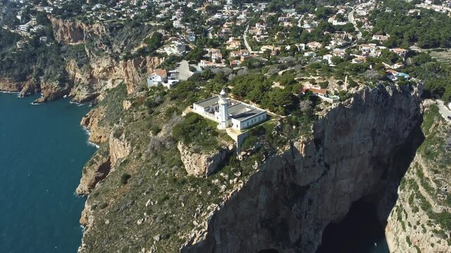 Cabo de la Nau cliffs and lighthouse, Spain, drone view