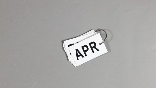 calendar papers displaying April 01, emphasizing the transition from March to April. Ideal for seasonal promotions, planning, and time management themes