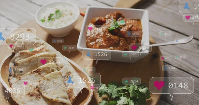 Vertical video: Animating like icons rising over board, showing likes for naan, curry, rice