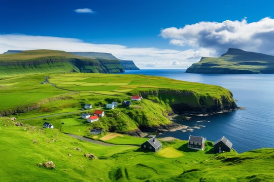 Traditional houses nestled on a lush green hillside overlooking the atlantic ocean