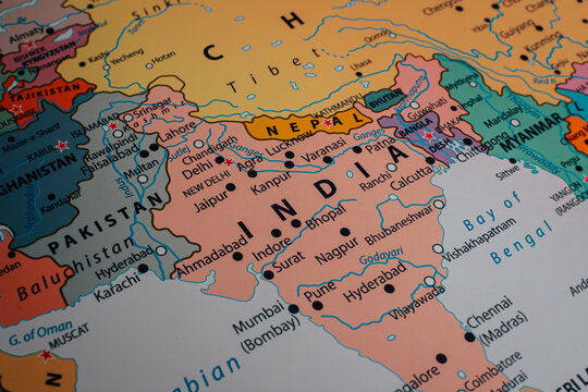 Colorful paper map showing India, Pakistan and neighboring countries.