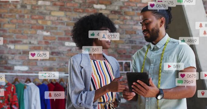 Boutique team tapping tablet and holding tape, monitoring rising likes over tablet and torsos