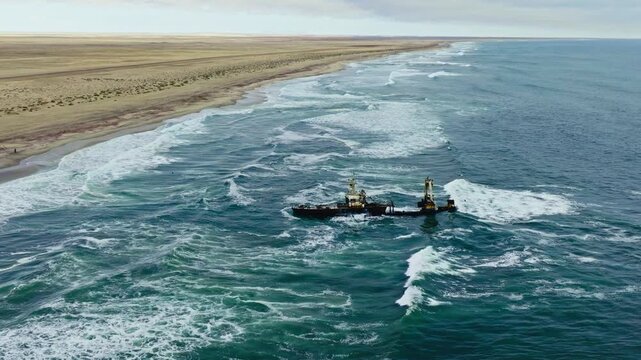 Drone flight around shipwreck in Namibia Skeleton coast.