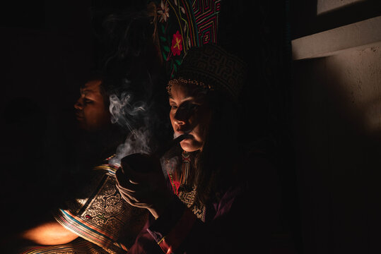 Shipibo Woman and mapacho smoke