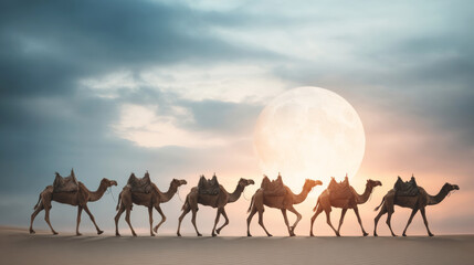 Fototapeta premium Desert caravan of camels walking in silhouette with saddles across sand dunes at dusk, large moon creating warm glow