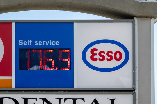 Calgary, Alberta, Canada. March 27, 2026. An Esso gas station sign displays a high fuel price of 176.9 cents per litre during a winter price spike.