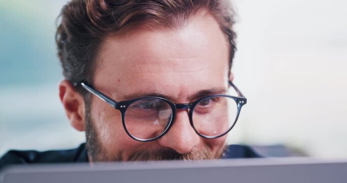 Design, laptop and smile of web developer man in office for programming, review or system update. Computer, development and glasses with programmer person in workplace for application framework