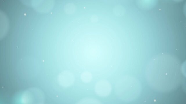 Soft light blue background with bokeh frame on edges and tiny sparkling dust particles