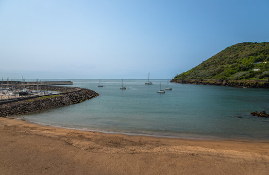 Exposure of the Prainha beach, prefect for a swim in the calm waters, located in the Terceira Island, just in the city center, near the Marina and the Fortress, Azores, Portugal