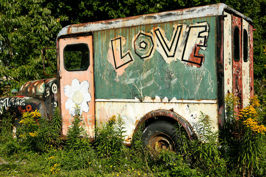 Abandoned Vintage Truck with Make Love Not War Hippie Message
