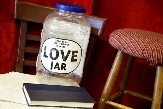 Love Jar with Notebook in Cozy Vintage Interior Setting