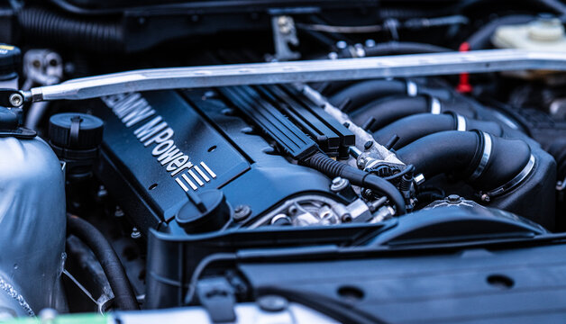 Lindesnes, Norway - June 21 2024: High performance BMW engine components visible under open hood.