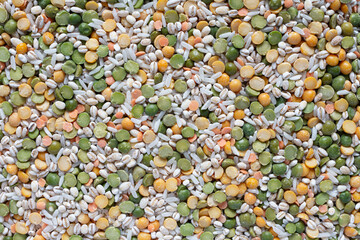 An top view abstracted image of a variety of dried vegetables used to make homemade vegetable soup from scratch. 