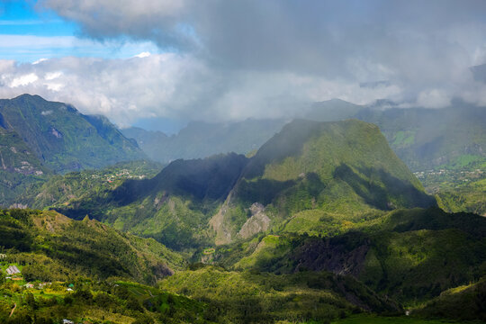 Scenic cloudy landscape of Cirque de Salazie, La Reunion island, French oversea department, Indian Ocean	