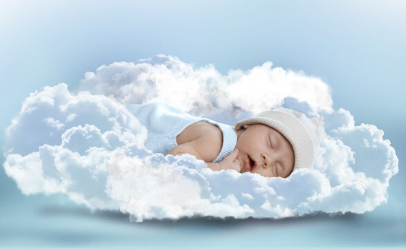 Adorable little baby sleeping in fluffy cloud