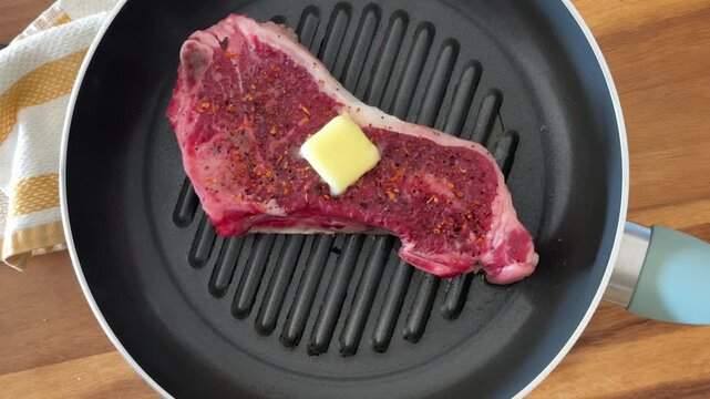 Cooking a New York Sirloin Steak to a Hot Pan