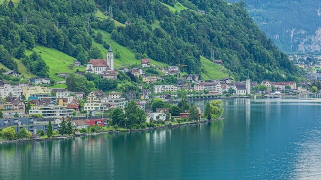 Time lapse, a lakeside village nestled on the hills of the Swiss mountains at the southern end of Lake Lucerne. Fluelen, canton Uri, Switzerland.