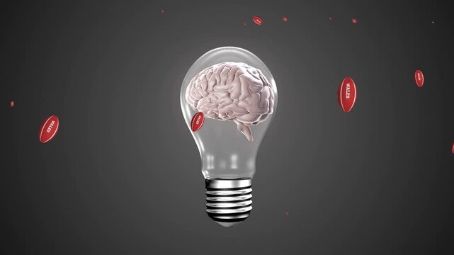 Animation of rugby balls with wales over light bulb with brain