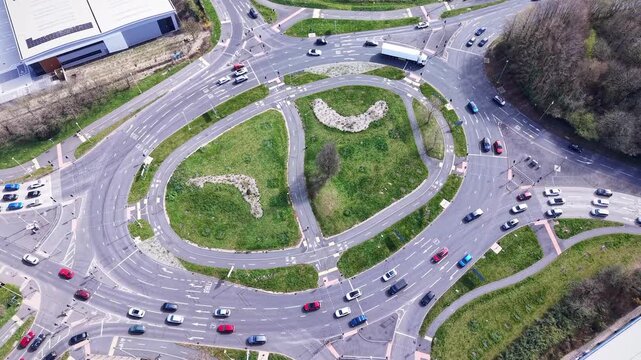 Aerial Top Down View of Urban Roundabout Traffic in Basingstoke UK