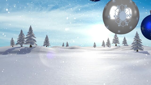 Animation of christmas baubles over christmas winter scenery with snow falling