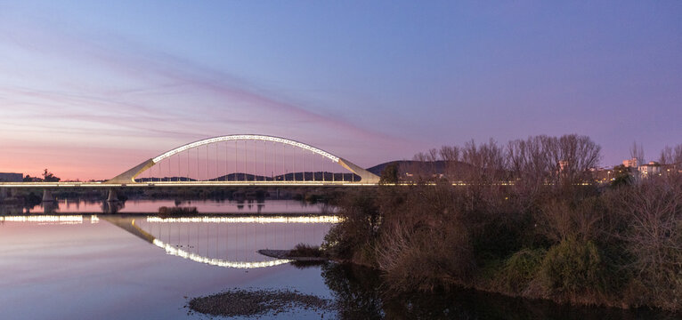 Sunset view of the Guadiana River as seen from the Puente Romano bridge in Merida Spain ESP