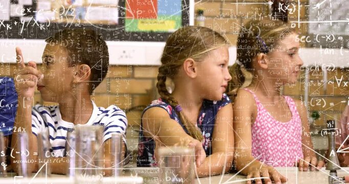 Boy pointing at offframe cue, girls using glass and talking during demo while math overlaying frame