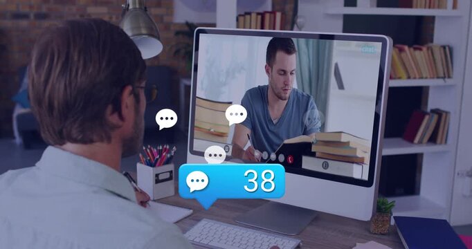 Man at desk watching screen taking notes for study, chat icon appearing near screen, counter rising