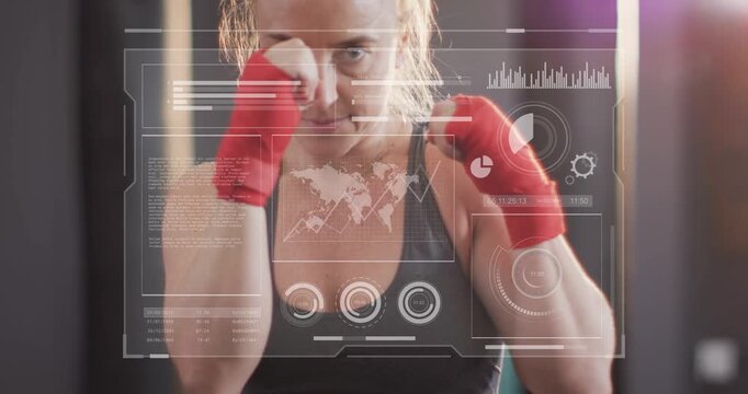 Training boxer in gray sports bra adjusting red wraps and throwing jabs at gym with HUD