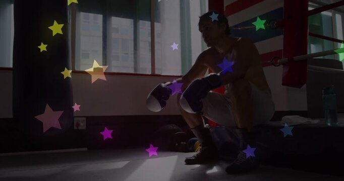 Boxer resting ringside between rounds, adjusting gloves as stars drift across frame obscuring hands