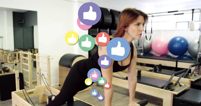 Woman doing pilates on reformer starting hands-knees for core, animated likes clustering on torso