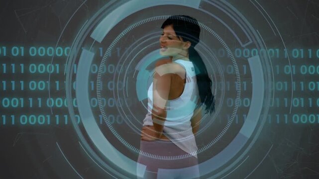 Vertical video: Projection cueing studio model in tank, pants, turning to camera, HUD binary bands