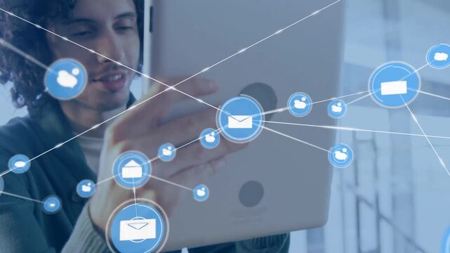Man using tablet, mail icon over cup sparking blue network covering face and tablet for work