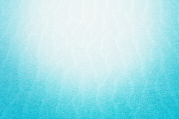 砂浜に浮き出た風紋と水色のグラデーション