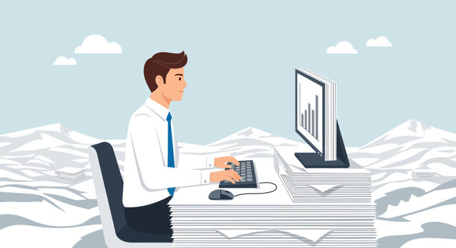 Overwhelmed businessman working on computer surrounded by stacks of paper in bright studio