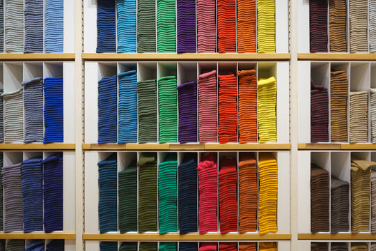 Tokyo, Japan - Oct 14 2024,  A close-up view of a counter with neatly arranged socks of different colors at a Uniqlo store in the Ginza district, without people, Tokyo, Japan