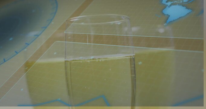 Clear drinking glass moving into focus after camera shift, revealing rim, bubbles, showing contours