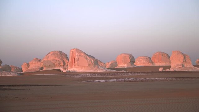 White Desert Egypt Chalk Rock Formations at Dusk with Dramatic Sky
