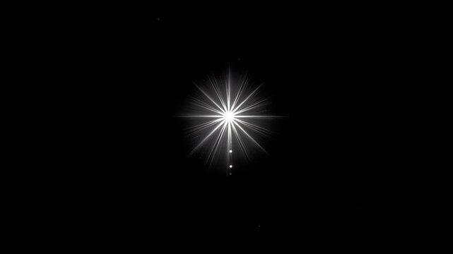 Bright starburst with radiating beams and a small secondary light nearby against a black background