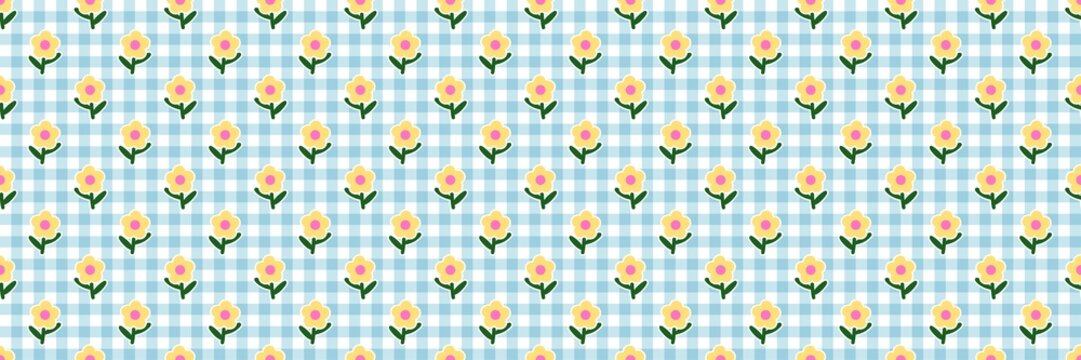 Seamless pattern with yellow daisy flowers on a light blue gingham checkered background. Classic blue gingham plaid pattern backdrop.
