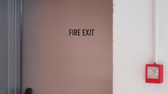 Fire exit sign and alarm system in commercial building